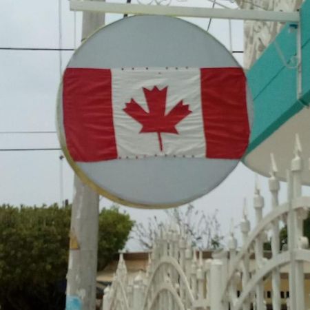 Canadian House Tolu Hotel Exterior foto